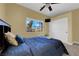 Bedroom featuring a ceiling fan and a window providing natural light at 9852 Snowy Canyon Ct, Las Vegas, NV 89183