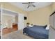 Bedroom featuring an open door and a window providing natural light at 9852 Snowy Canyon Ct, Las Vegas, NV 89183