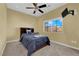 Bedroom featuring a ceiling fan and a window providing natural light at 9852 Snowy Canyon Ct, Las Vegas, NV 89183