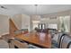 Spacious dining room with large table and chairs near staircase at 9852 Snowy Canyon Ct, Las Vegas, NV 89183