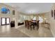 An open-concept dining area with a fireplace and a window with natural light at 9852 Snowy Canyon Ct, Las Vegas, NV 89183