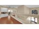 Second-floor hallway featuring hard wood floors and white trim at 9852 Snowy Canyon Ct, Las Vegas, NV 89183