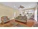 Living room with hardwood floors and views to kitchen at 9852 Snowy Canyon Ct, Las Vegas, NV 89183