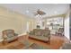 Living room with hardwood floors and view of kitchen at 9852 Snowy Canyon Ct, Las Vegas, NV 89183