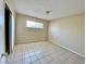 Spacious bedroom with tile floors and a large closet at 99 N 21St St, Las Vegas, NV 89101