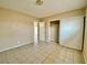 Bedroom with tile floors and access to another room at 99 N 21St St, Las Vegas, NV 89101