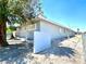 Light gray stucco home with a landscaped area at 99 N 21St St, Las Vegas, NV 89101