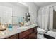 Clean bathroom with a shower/tub combo and granite countertop at 5405 Indian River Dr # 392, Las Vegas, NV 89103