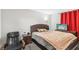 Cozy bedroom with a comfortable bed and a massage chair at , Las Vegas, NV 89103