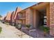 Exterior view of the building showcasing stone and red accents at , Las Vegas, NV 89103