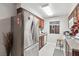 Stainless steel appliances and wood cabinets in this galley kitchen at 5405 Indian River Dr # 392, Las Vegas, NV 89103