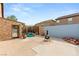 Backyard with pool, fire pit, and stone wall at 10093 Golden Bluff Ave, Las Vegas, NV 89148