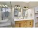 Modern bathroom with double vanity and walk-in shower at 10369 Niagara Falls Ln, Las Vegas, NV 89144