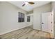 Charming bedroom with mirrored closet and ceiling fan at 10369 Niagara Falls Ln, Las Vegas, NV 89144