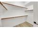 Large walk-in closet with ample shelving and rods at 10369 Niagara Falls Ln, Las Vegas, NV 89144