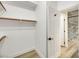 Bright walk-in closet with built-in shelving at 10369 Niagara Falls Ln, Las Vegas, NV 89144