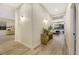 Bright hallway with light wood flooring and neutral walls at 10369 Niagara Falls Ln, Las Vegas, NV 89144