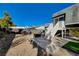 Spacious backyard patio with fire pit and seating area at 108 Breeze Ct, Las Vegas, NV 89145