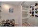 Shelving and hanging space with shoe storage at 108 Breeze Ct, Las Vegas, NV 89145