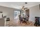 Bright dining room with round table and chairs, adjacent to the kitchen at 108 Breeze Ct, Las Vegas, NV 89145