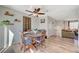 Cozy dining area with round table and chairs, near kitchen and living room at 108 Breeze Ct, Las Vegas, NV 89145