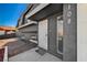 Modern front door with decorative metal gate at 108 Breeze Ct, Las Vegas, NV 89145