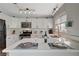 Modern kitchen with white cabinets, stainless steel appliances and breakfast bar seating at 108 Breeze Ct, Las Vegas, NV 89145