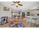 Modern kitchen with white cabinets, stainless steel appliances, and island at 108 Breeze Ct, Las Vegas, NV 89145