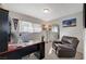 Functional home office with a desk and leather recliner at 108 Breeze Ct, Las Vegas, NV 89145