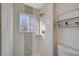 Shower stall with patterned tile and stained-glass window at 108 Breeze Ct, Las Vegas, NV 89145