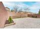 Neatly landscaped backyard with a patio at 10810 Hunters Green Ave, Las Vegas, NV 89166