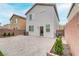 Private backyard with patio and home view at 10810 Hunters Green Ave, Las Vegas, NV 89166