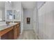 Bathroom boasts granite countertop and shower at 10810 Hunters Green Ave, Las Vegas, NV 89166