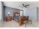 Well-lit bedroom featuring a wooden bed frame at 10810 Hunters Green Ave, Las Vegas, NV 89166