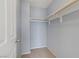 Large walk-in closet with double hanging rods at 10810 Hunters Green Ave, Las Vegas, NV 89166