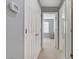 Clean hallway with access to multiple rooms at 10810 Hunters Green Ave, Las Vegas, NV 89166