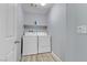 Laundry room with washer and dryer and a shelf at 10810 Hunters Green Ave, Las Vegas, NV 89166