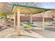 Covered picnic table in a community park setting at 10810 Hunters Green Ave, Las Vegas, NV 89166