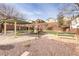 Community playground with play structures, picnic area, and shaded seating at 10810 Hunters Green Ave, Las Vegas, NV 89166