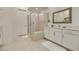 Bathroom with walk-in shower, tub and vanity at 11130 Red Yucca Dr, Las Vegas, NV 89138