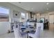 Bright dining area with a wooden table and comfortable seating for four at 11130 Red Yucca Dr, Las Vegas, NV 89138