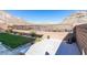 Stone patio with seating area and mountain views at 11130 Red Yucca Dr, Las Vegas, NV 89138