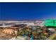 Stunning nighttime aerial view showcasing the property's prime location and city lights at 145 E Harmon Ave # 2120, Las Vegas, NV 89109