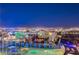 Night view of city skyline and golf course from condo at 145 E Harmon Ave # 2120, Las Vegas, NV 89109