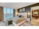 Bright main bedroom with city views and ensuite bathroom at 145 E Harmon Ave # 2120, Las Vegas, NV 89109