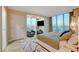 Relaxing main bedroom with sitting area and stunning city views at 145 E Harmon Ave # 2120, Las Vegas, NV 89109