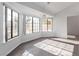 Sunlit dining area with large windows and hardwood floors at 1911 Hobson Dr, Henderson, NV 89074