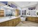 Elegant bathroom with double vanity and free standing tub at 1928 Oliver Springs St, Henderson, NV 89052