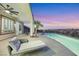 Relaxing patio with pool and stunning sunset views at 1928 Oliver Springs St, Henderson, NV 89052