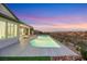 Relaxing pool area with a beautiful sunset view at 1928 Oliver Springs St, Henderson, NV 89052